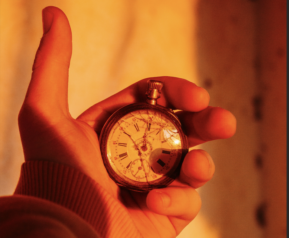 Sunlit pocket watch in a hand. Image by Gaspar Uhas on Unsplash. Thanks Gaspar.