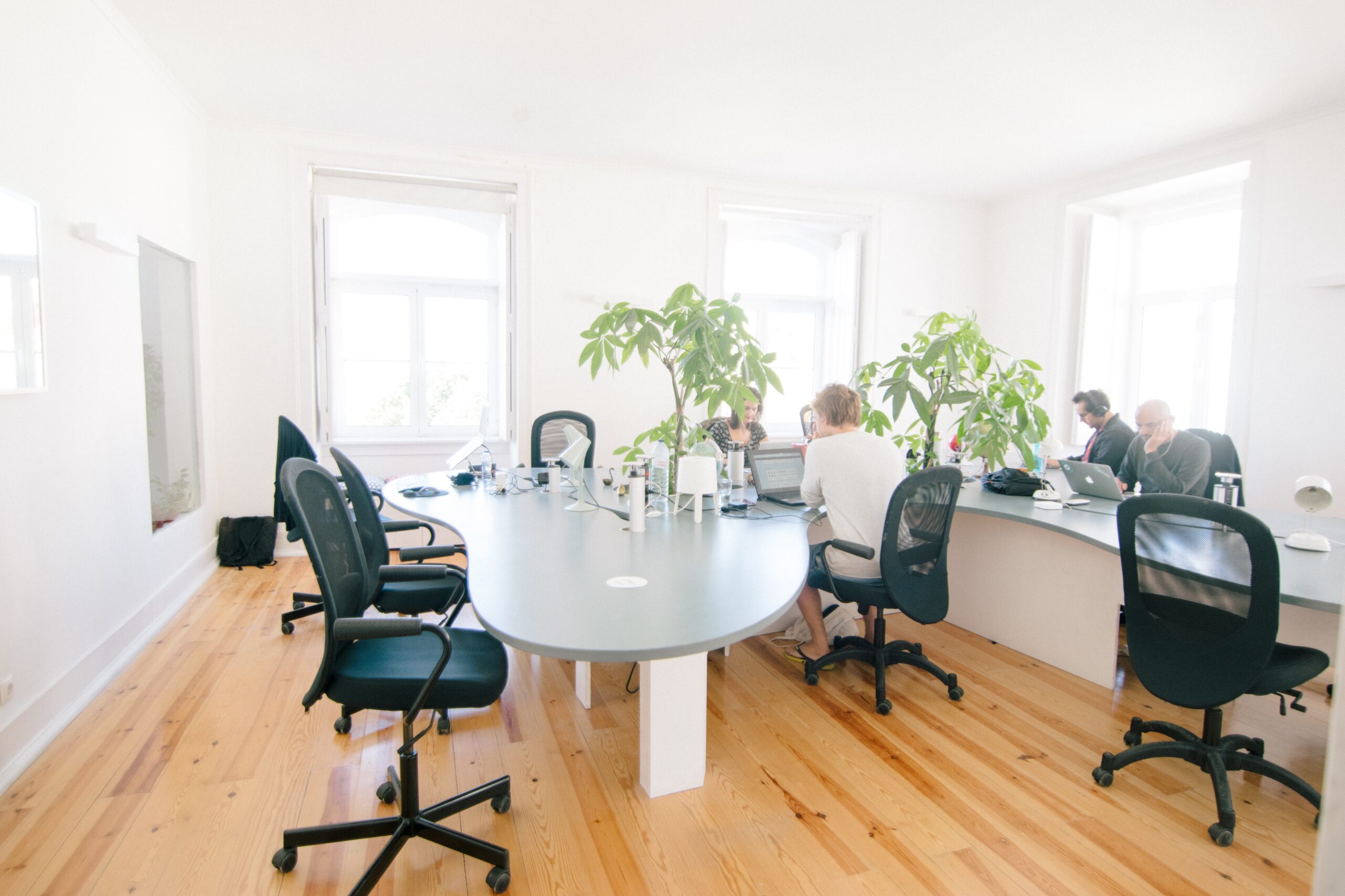 A mainly empty office. Photo by Ben Collins on Unsplash. Thanks Ben.
